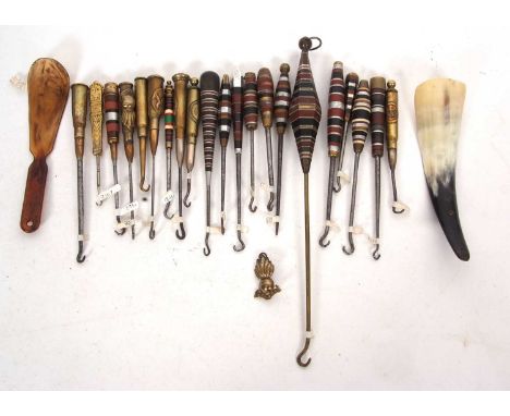 Group of seven World War I trench art button hooks with rifle shells and steel hooks, thireen trench art mixed metal banded a