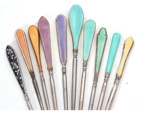 A group of ten enamel handled and steel button hooks, six Art Deco examples, hallmarked Birmingham 1925/31, 20-23cm long, one