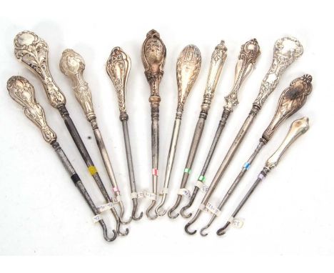 Group of eleven late 19th/early 20th Century silver handled button hooks (steel hooks), various dates/makers