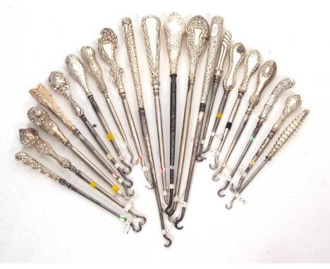 Group of twenty late 19th/early 20th Century silver handled button hooks, various dates/makers, 14-28cm