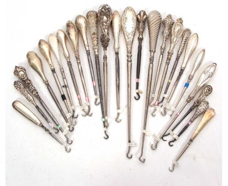 Group of twenty four late 9th/early 20th Century silver and steel button hooks, various dates/makers, 9-27cm long