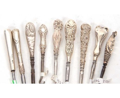 Group of seven late 19th/early 20th Century silver and steel button hooks, various dates and makers, 8-11cm long together wit