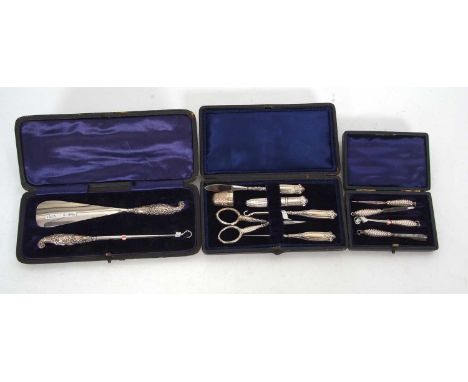 Cased vintage metal sewing set, cased small set button hook with tweezer and file, Birmingham 1890 together with a cased butt