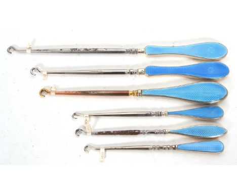 Group of six early 20th Century silver and blue enamel guillouche button hooks (steel hooks) various dates/makers, 15-26cm