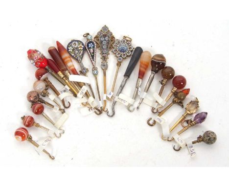 A group of twelve small agate handled button hooks, four small micro mosaic examples together with five glass and one jet but