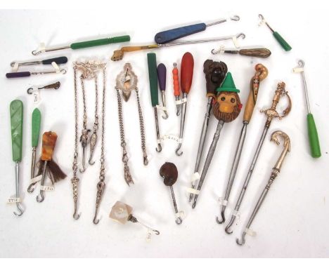 Mixed Lot: An early 20th Century L.S Brenner &amp; Co white metal chatelaine suspending four hallmarked silver small button h