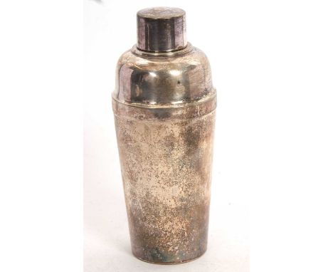 A vintage silver plated cocktail shaker stamped below IaN 20cm tall