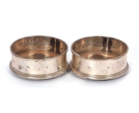 A pair of Elizabeth II silver and treen bottle coasters, Birmingham 1994, makers mark Harrison &amp; Bros and Howson Ltd, 9cm