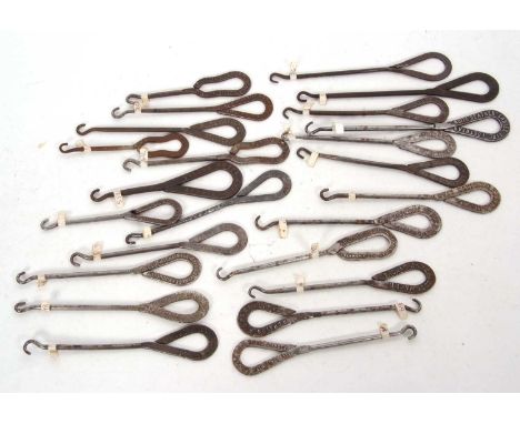 Group of steel advertising button hooks circa 1900 including eight American examples, German and one marked Saxony together w