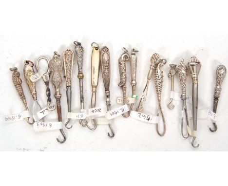 A group of ten small late 19th/early 20th Century silver and steel button hooks together with five unmarked examples, 4-8cm i
