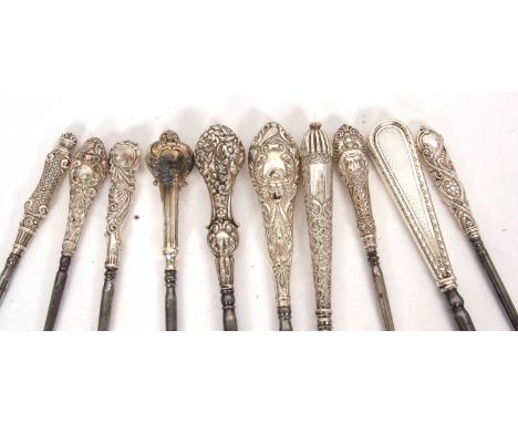 Group of ten late 19th/early 20th Century silver and steel button hooks, various dates/makers, 16-27cm long