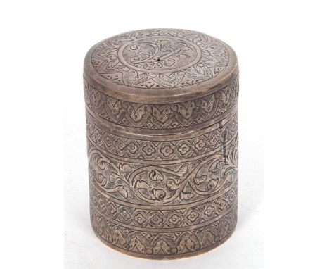 An antique eastern white metal cannister tea caddy decorated with bands of trailing leaves, scrolls etc,118gms, 9cm tall