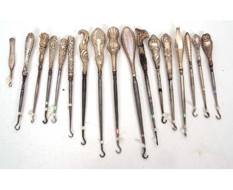 Group of seventeen late 19th/early 20th Century silver and steel button hooks, various dates/makers, 9.5-26cm