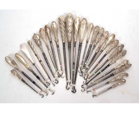 Group of twenty four late 19th/early 20th Century silver and steel button hooks, various dates/makers, 10-23cm together with 