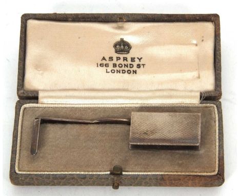 An unusual Asprey &amp; Co spring loaded silver patented  bookmark, engine turned detail and hallmarked for 1932, in original