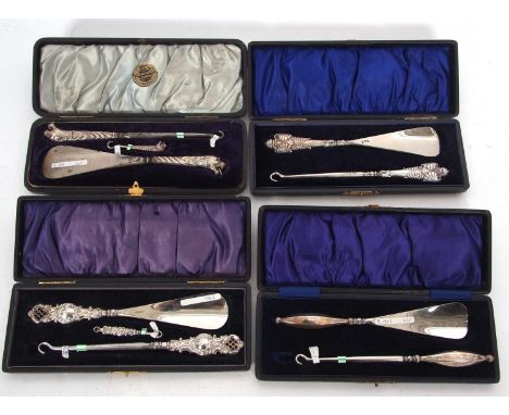 Four cased button hook and shoe horn sets, Birmingham 1897, 1901, 1909 and 1913