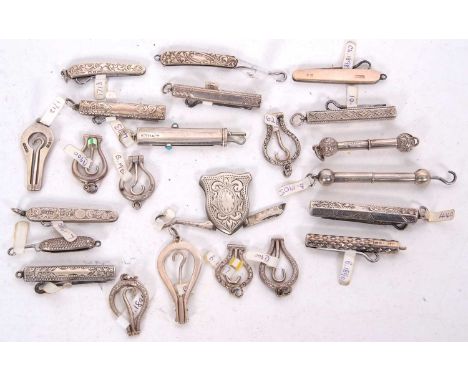 Group of seven Victorian/Edwardian folding chatelaine button or glove hooks, eight small late 19th/early 20th Century silver 