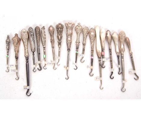 A group of fifteen late 19th/early 20th Century small silver handled button hooks, various dates and makers, 8-13cm long toge