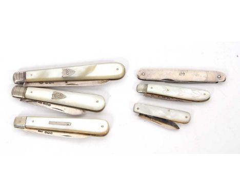 A group of five silver bladed folding fruit knives, mother of pearl handles together with a silver cased steel bladed knife