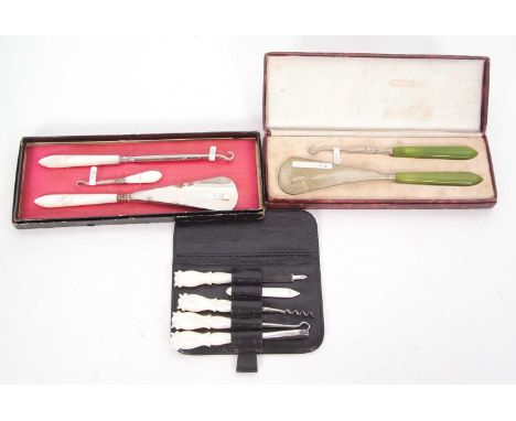 Mixed Lot: A leather cased travelling mother of pearl handle vanity set, two boxed button hook and shoe horn combinations (3)