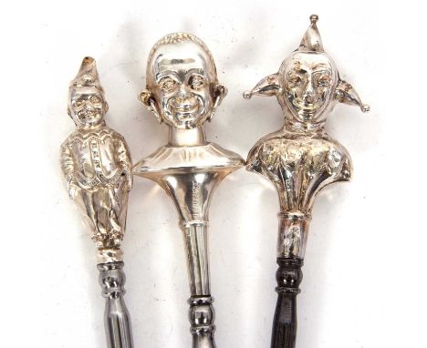 An Edwardian silver figural double sided Jester novelty button hook, Birmingham 1909, Chrisford &amp; Norris, a silver figura