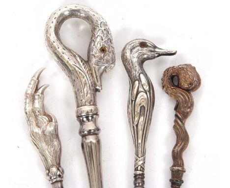 A Victorian solid silver mounted novelty swan button hook with glass eyes, hallmarked for Birmingham 1899, 24.5cm long, an Ed