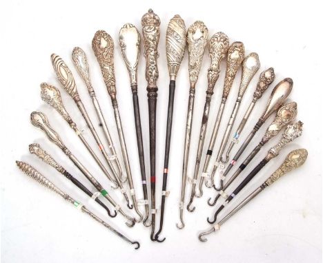Group of eighteen late 19th/early 20th Century silver and steel button hooks, various dates/makers, 13-27cm long together wit