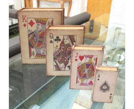 STORAGE BOOKS, a set of four, playing card designs in antiqued bindings, lined interiors, largest 36cm H x 27cm W. (4)