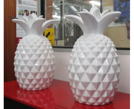 CERAMIC PINEAPPLES, a pair, Italian, white glazed, 50cm H. (2)