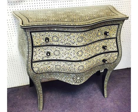 BOMBE COMMODE, Syrian mother of pearl inlaid, with three long drawers, 76cm H x 83cm W x 40cm D (one handle lacking).  