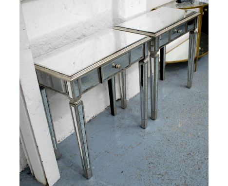 CONSOLE TABLES, a pair, with single drawer, silvered glass tapered supports. (2)