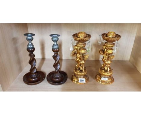 PAIR OF CHERUB CANDLESTICK & PAIR OF BARLEY TWIST CANDLESTICKS
