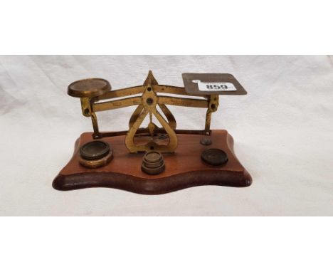 A SET OF VINTAGE POSTAGE SCALES