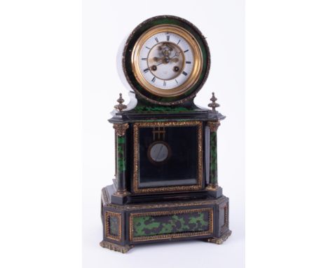 An ebonised and green marble effect French mantel clock, the dial escapement window inscribed H. Marc, Paris with pendulum an