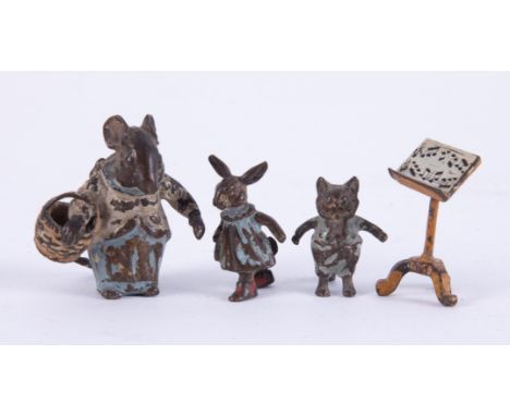 Beatrix Potter miniature bronze figures, (3) and a music stand, the tallest 30mm.