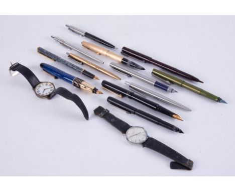 A collection of various pens including an Osmiroid left hand fountain pen, Parker pens, also a Longines wristwatch and anothe