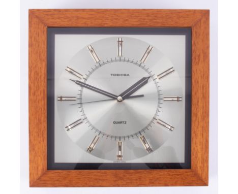 A Toshiba quartz wall clock.