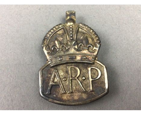 AIR RAID PRECAUTION SILVER BUTTON,along with other items including a Naval sweetheart brooch and a King's Own Scottish Border