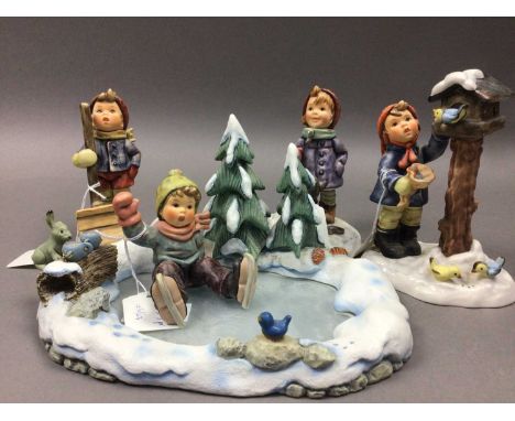 FOUR HUMMEL 'WINTER TIME' FIGURES,on lake base