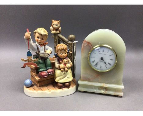 HUMMEL FIGURE GROUP,with boy, girl, puppet and cat, 17cm high, along with an onyx mantel clock (2)