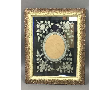 PAIR OF VICTORIAN MIRRORED PHOTOGRAPH FRAMES,the oval portrait windows within floral design bevelled glass panels, in rectang