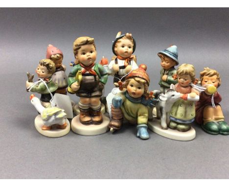 NINE HUMMEL FIGURES,including children with animals 