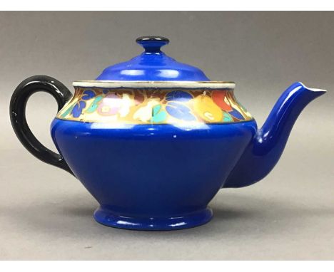 BRITANNIA POTTERY TEA POT &amp; JUG,the tea pot 12cm high, decorated with floral displays, marked to base and complete with l