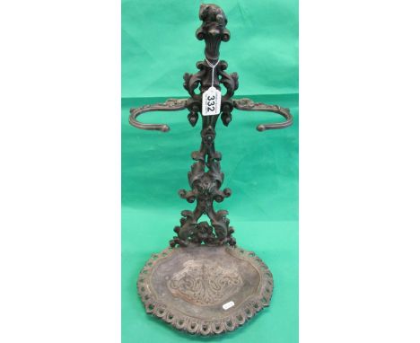 Metal stick stand adorned with mouse