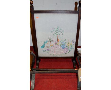 A pair of Arts & Crafts forged andirons; together with an oak fire screen (2)