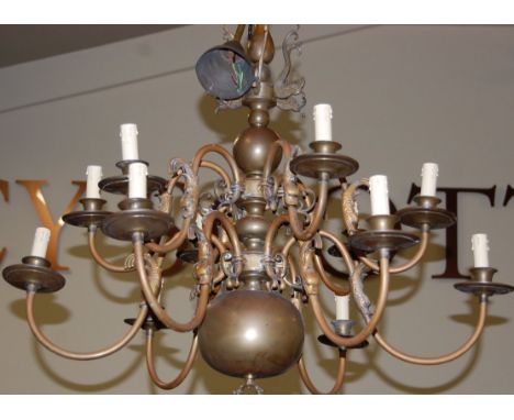 A Dutch brass twelve light hanging electrolier, of tiered form, approx drop 80cm 