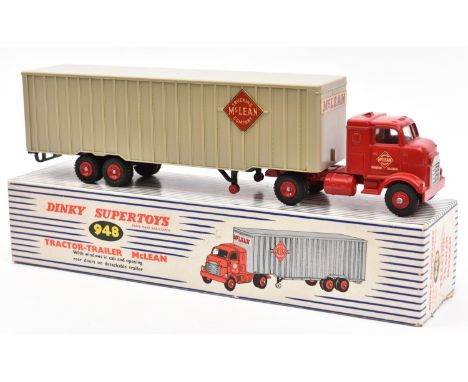 A Dinky Supertoys Tractor-Trailer McLean (948). In red and grey 'McLean Trucking Company' livery, with red plastic wheels. Bo