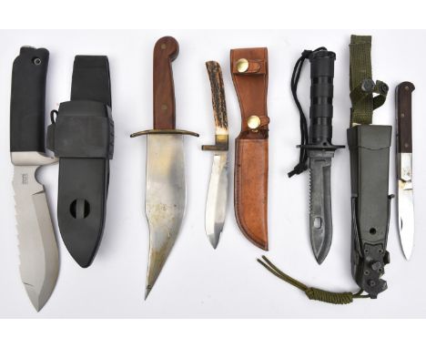A modern hunting knife, swollen sawback blade 7½”, by Wilkinson, rubber grip, in composition sheath with rubber belt loops; a