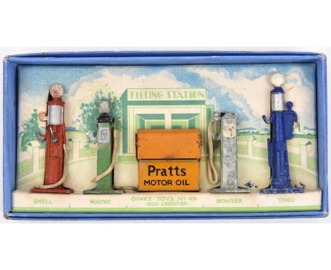 A Pre-War Dinky Toys PETROL PUMPS set No.49. Comprising 4 pumps, in red, green, dark blue and light blue (badly faded). Compl