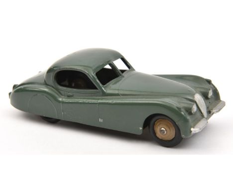 Dinky Toys Jaguar XK120 (157). In sage green with beige wheels and black rubber tyres. VGC  very minor chips only. £50-70 